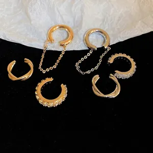 6-piece cubic zirconia ear cuff set in gold and silver finishes with woven and chain designs