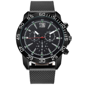 Detailed view of black stainless steel mesh band and luminous three-eye chrono watch dial