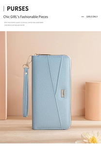 Vertical view of a light blue textured leather long wallet with golden zipper and wrist strap