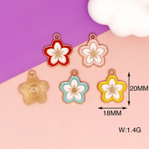 Detail view of colorful enamel cherry blossom pendants with 20MM height and 18MM width dimensions