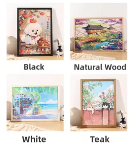 Custom wood puzzle frames in black, natural wood, white, and teak finishes for 1000 pieces