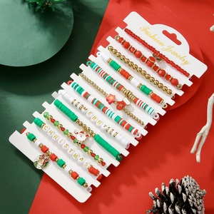 Detailed set of Christmas bracelets with Santa charms and Merry Christmas letter beads