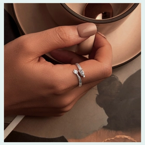 Detailed view of an S925 sterling silver dragon wrap ring with intricate scale textures