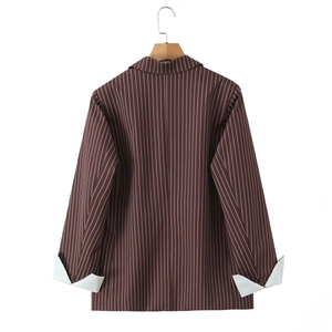 Detail view of brown striped blazer back featuring stylish wide white folded cuffs on sleeves