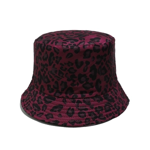 Detailed view of dark red leopard print bucket hat showing reinforced brim stitching