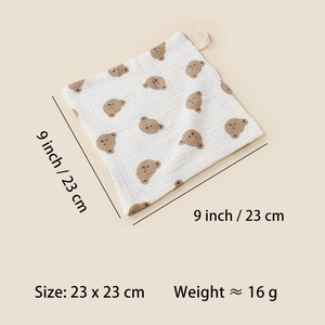 Close-up of 23x23cm baby cotton muslin washcloth with bear print and hanging loop
