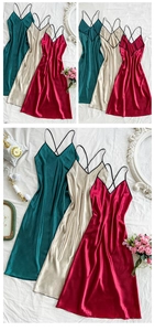 Detail of satin long sleepwear dress with v-neckline and cross back straps in various colors