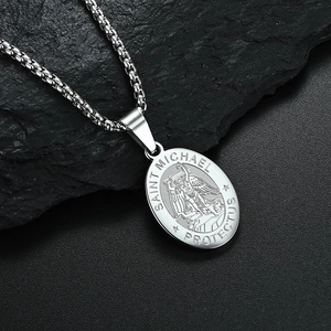 Silver Saint Michael protect us pendant necklace on black stone background for men