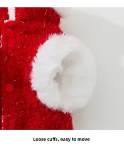 Detail of red fleece pet vest with plush white fur cuffs and subtle silver glitter threads