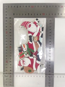 Detailed view of Santa and snowman wood door corner decor measuring 18cm by 11cm