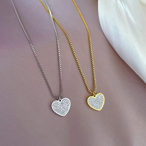 Minimalist heart necklaces in gold and silver finish with pavé set crystals for women