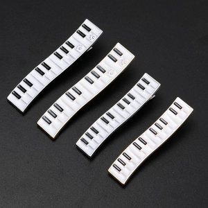 Elegant piano key hair clips set with black and white enamel finish for women