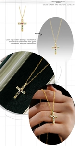 Detail of s925 silver gold cross necklace with colorful zircons and hammered texture