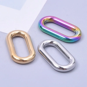 Three oval stainless steel connectors in gold, silver, and rainbow plating for jewelry making