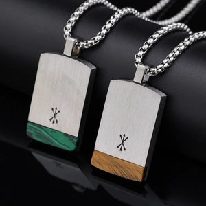 Men's stainless steel tag necklaces with malachite and tiger eye stones featuring arrow engraving