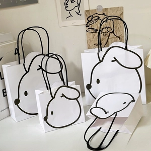 Detail of mini rabbit paper gift bags in small and medium sizes with nylon handles