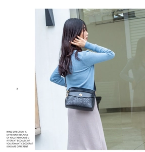 Women's black shoulder cross-body bag waterproof PU leather floral messenger bag stylish.