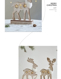 Close-up of wooden Christmas deer with snowflake cutout and warm LED glow detail