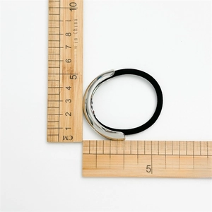 Minimalist elastic hair tie with silver curved alloy detail showing 5cm outer diameter