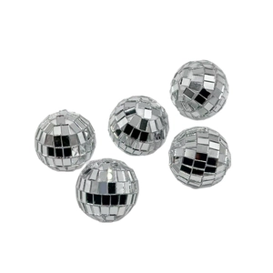 Set of five silver mirror disco balls in various sizes for sparkling holiday decoration