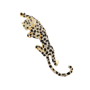 Elegant gold leopard brooch with sparkling rhinestones and black enamel spots for suits