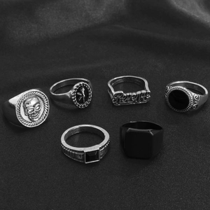 Set of 6 vintage silver and black alloy rings featuring skull and geometric punk designs