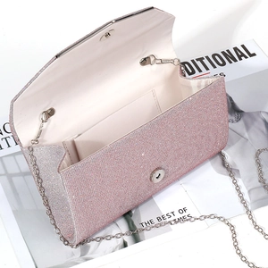 Sparkly pink glitter evening clutch bag with silver chain strap and magnetic closure
