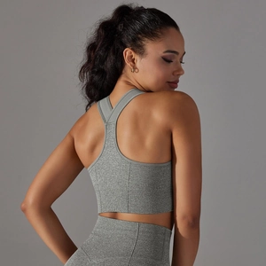 Detailed back view of grey racerback sports bra and high-waisted seamless leggings set