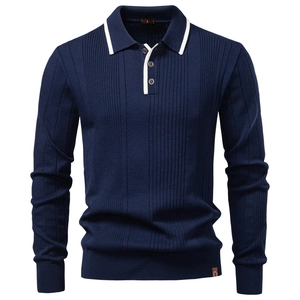 Detailed close-up of dark blue knit sweater collar with white contrast stripe trim