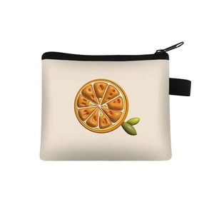 Detail of cream fabric coin purse with orange slice print and black zipper closure