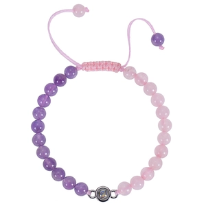 Detail of adjustable pink and purple beaded bracelet with functional silver projection stone