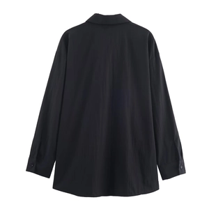 Back view of a classic black long-sleeved poplin shirt with a minimalist casual design