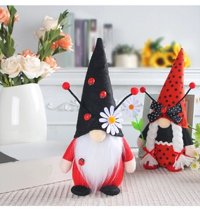 Detail of ladybug themed holiday gnomes with felt texture and daisy element ornaments