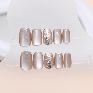 Champagne cat-eye press-on nails set with glitter sequins in short square-oval shape
