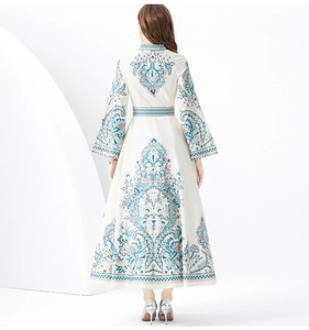 Back view of a bohemian maxi dress with paisley prints and elegant flared sleeves