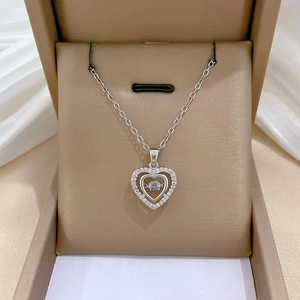 Double-layer heart pendant necklace in titanium steel with shimmering cubic zirconia