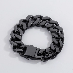 Macro shot of 20mm matte black stainless steel Cuban link bracelet with rectangle clasp