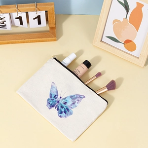 Canvas makeup pouch with purple butterfly print and storage space for brushes and cosmetics