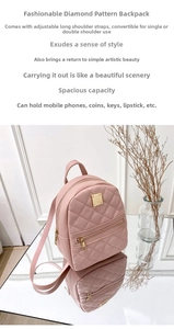 Pink quilted mini backpack with adjustable straps and metallic nameplate detail