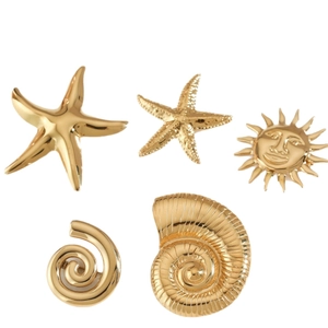 Five-piece gold stainless steel brooch set featuring starfish and sun ocean designs