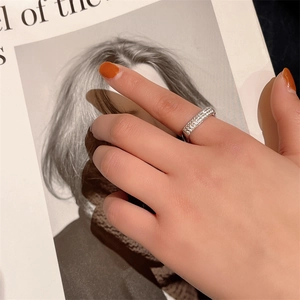 Elegant silver square open ring with multi-row micro-pave diamonds on a model's hand