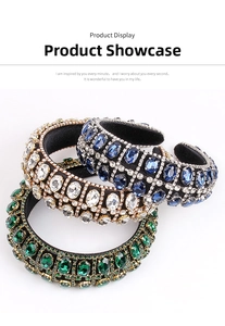 Detailed view of Baroque sponge headbands with blue, white, and green crystals on black velvet