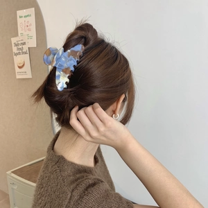 Blue and brown marble acetate shark hair claw clip for elegant women's updos