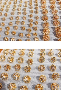 Close-up of sky blue crystal flower earrings with gold plating and cubic zirconia