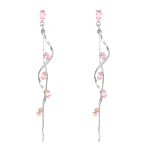 Detail view of silver spiral tassel earrings featuring pink marquise-cut crystals