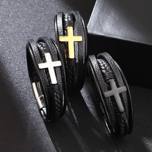 Men's braided leather bracelet with magnetic cross clasp in gold, silver, and black