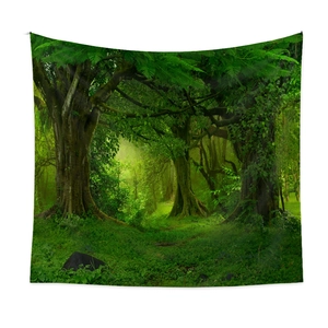 Detail of lush green forest tapestry hanging on white wall for natural room decoration