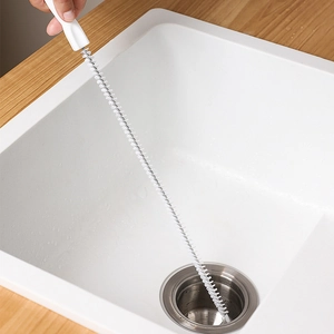 Flexible white drain cleaning brush with nylon bristles for kitchen sink hair removal