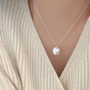 Minimalist S925 sterling silver necklace featuring a polished round solid pendant