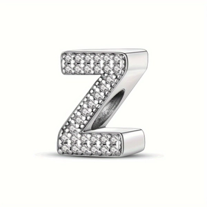 Macro detail of silver letter Z charm with micro-pave cubic zirconia crystals